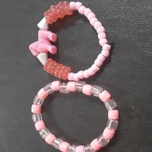 🌹 Pink bracelets with lion.